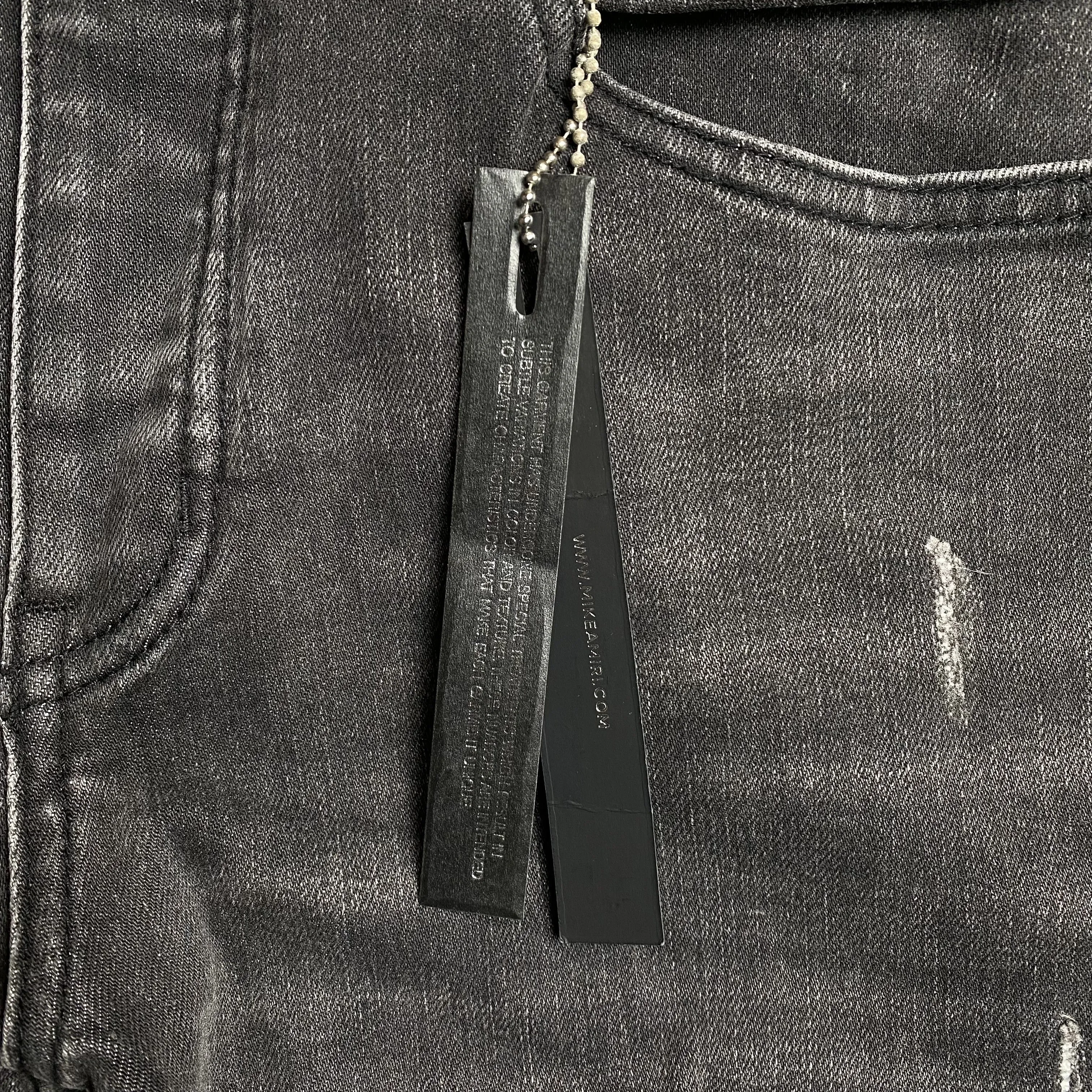AMIRI SLASH SLIM JEANS