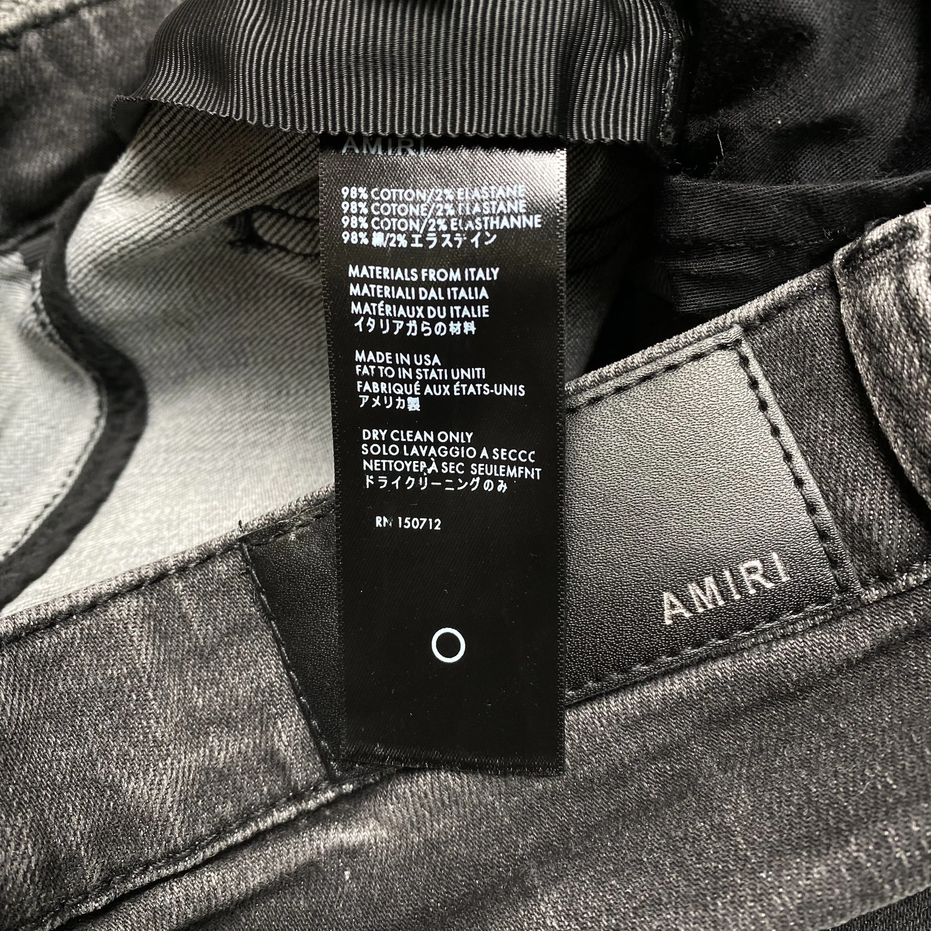 AMIRI SLASH SLIM JEANS
