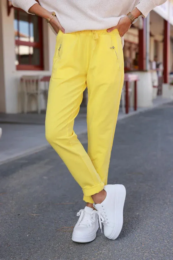 Yellow cotton jogging bottoms with embroidered cheveron outseams