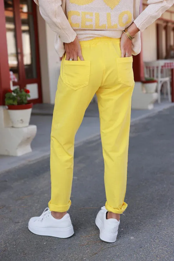 Yellow cotton jogging bottoms with embroidered cheveron outseams
